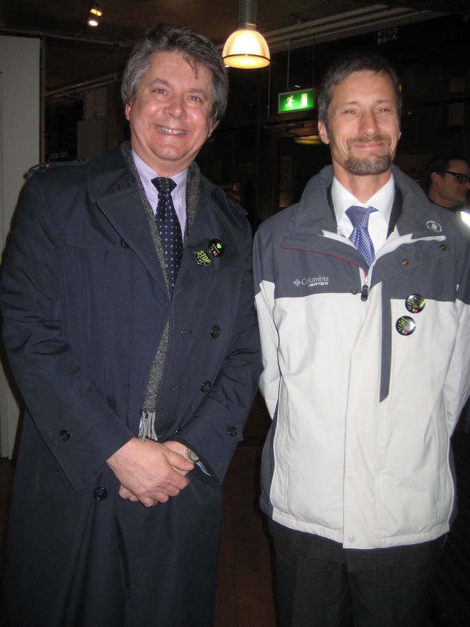 Happy customers wearing GUT badges